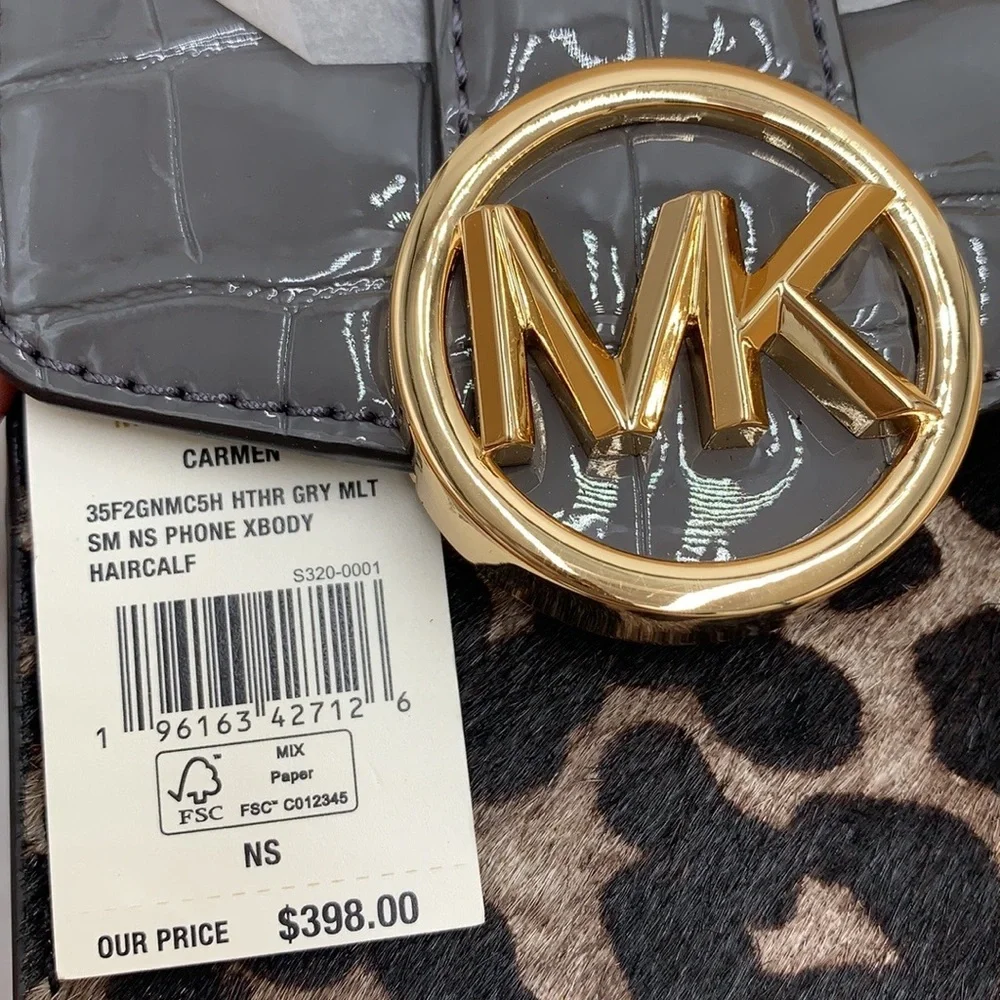 Brand New with Tag
Michael Kors Carmen Small NS Phone XBODY HairCalf Gre… - Picture 16 of 16